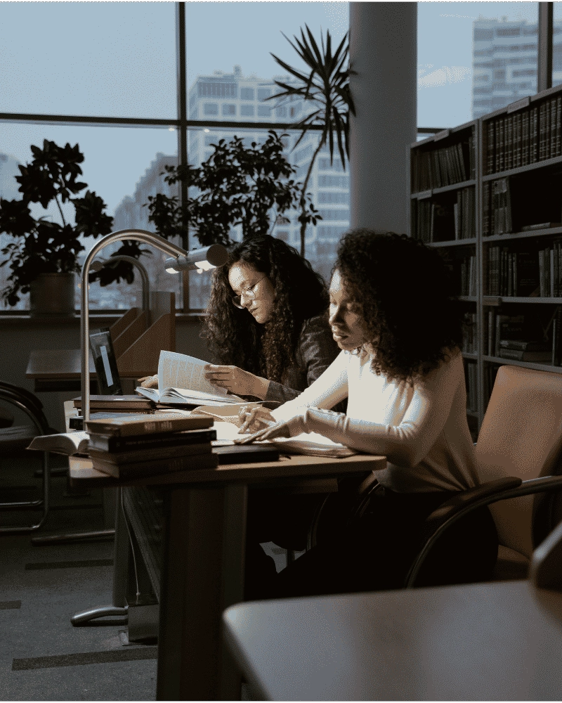 two students stuying at night